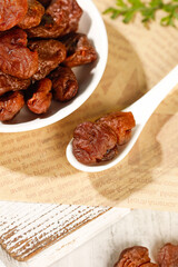 Dried Lychee Fruits from Gaozhou Fujian China in White Bowl on Wooden Background