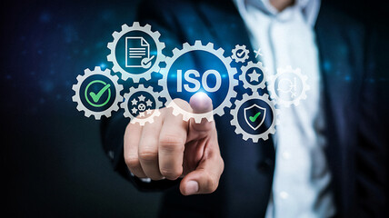 Businessman touches iso certification gears representing quality and standards
