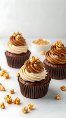 Chocolate Cupcakes With Swirled Frosting And Caramel Popcorn Topping Served As Sweet Dessert