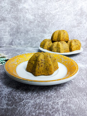 Delicious steamed banana cake on a plate, Christmas cake