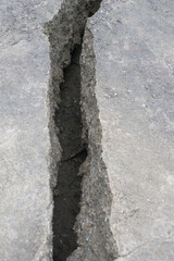 Cracks in the ground after a flood caused by heavy rains.