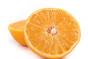Fresh Orange Halves Cut in Half Showing Juicy Citrus Segments on White Background