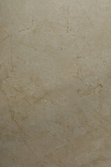 Natural beige marble texture with subtle veins and patterns for interior design inspiration