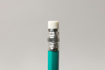 One graphite pencil on grey background, closeup