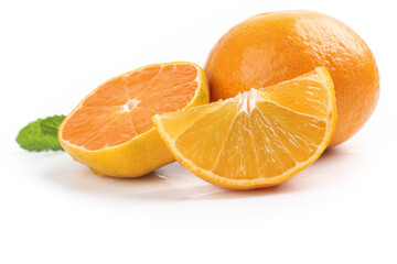 Fresh Oranges Sliced and Cut in Half with Mint Leaf on White Background