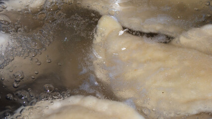 Cooking Pierogi or Varenyky in Boiling Water.