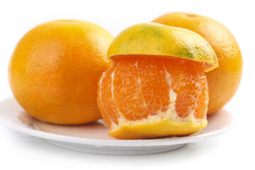 Fresh Ehime Oranges on White Background - Japanese Citrus Fruit with Peeled Segments