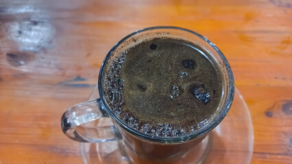 a picture of hot coffe in the glass