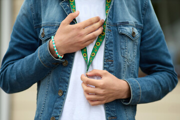 Fototapeta na wymiar Sunflower lanyard, symbol of people with invisible or hidden disabilities.