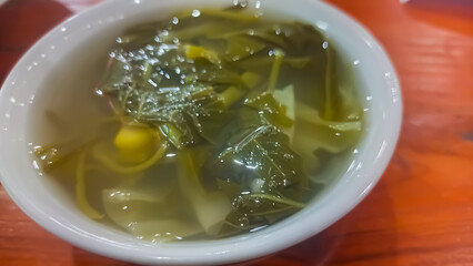 one portion of sayur asem or tamarind soup. indonesia healthy food