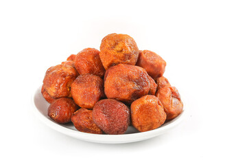 Dried Red Xinjiang Apricots on White Plate - Healthy Organic Fruit Snack