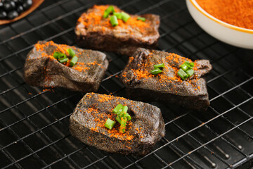 Grilled Seasoned Tofu Steaks with Scallions on Cooling Rack - Vegan Protein Food
