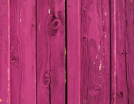Pink wooden planks close-up