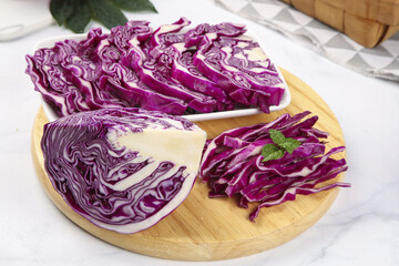Fresh Purple Cabbage Sliced and Shredded on Wooden Board - Healthy Vegetable Prep