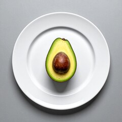 Halved Avocado on White Plate Minimalist Healthy Food Photography.