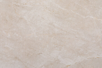 Light beige marble surface with subtle veins ideal for design and decoration in various settings