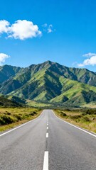 Naklejka premium Mountain road under blue sky