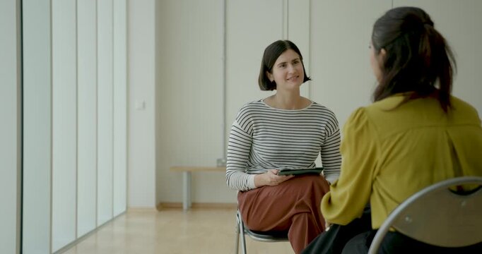 Business Interview with Digital tablet in Contemporary Office Setting