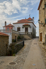 Historic stone street with traditional houses in Monsanto, Portugal
