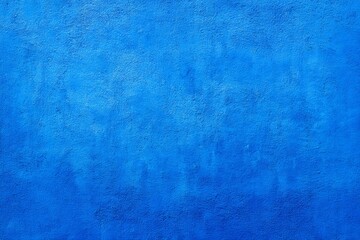 Fototapeta premium Vibrant textured blue wall background with subtle variations