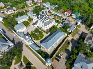 Fototapeta premium A wide aerial perspective showing the Holy Trinity Women's Monastery and the Annunciation Monastery complex surrounded by the cityscape of Murom.