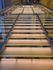 Staircase with illuminated steps in a modern interior