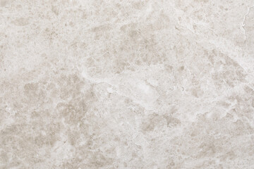 Light gray textured stone surface with subtle patterns ideal for interior design projects