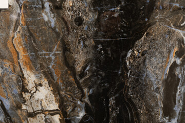 Unique natural stone surface showcasing intricate patterns and colors from a geological formation