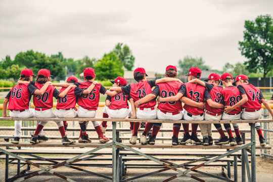 Group of baseball players standing together on the playground - Powered by Adobe