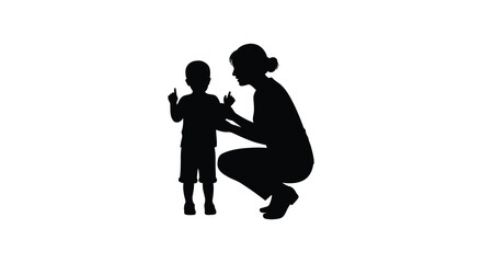 Silhouette of a mother crouching with her young child playing together