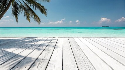 Fototapeta premium Tropical beach view from wooden deck with palm shadow White wooden deck overlooking turquoise tropical ocean with palm tree shadow and island on horizon, perfect for travel and relaxation. 