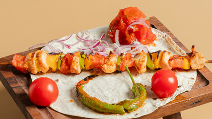 Kebab assortment on wooden tray