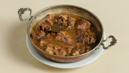 Beef stew in classic pan