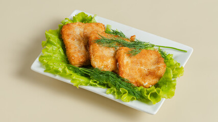 Chicken steaks on white plate