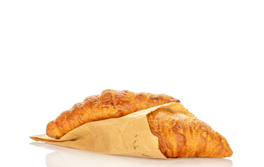 Chocolate croissants isolated on white background, close-up.