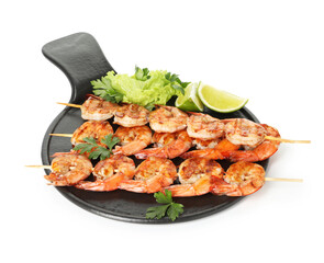 Skewers with tasty grilled shrimps, lime slices, parsley and lettuce isolated on white. Delicious seafood dish