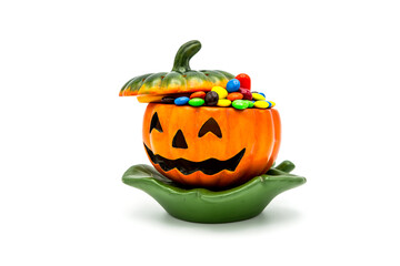 Halloween Jack o Lantern pail overflowing with colorful chocolate