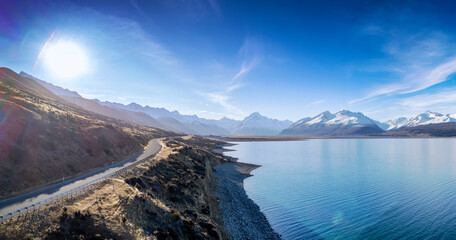Aerial view of the highway to Mt. Cook along Lake Pukaki in South Island of New Zealand on a clear day