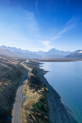 Aerial view of the highway to Mt. Cook along Lake Pukaki in South Island of New Zealand on a clear day