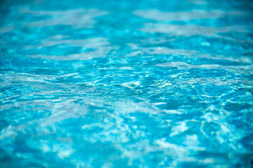 Blue ripped water in swimming pool, water pool texture and surface water backgraund.