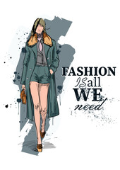 Set of young beautiful women in stylish clothes. Fashion sketch