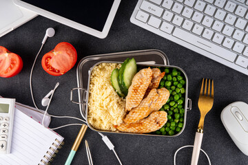 Packed homemade lunch for office, balanced healthy brunch with grilled chicken fillet, couscous...