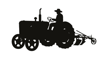 Fototapeta premium Silhouette of a farmer operating a vintage tractor in a field
