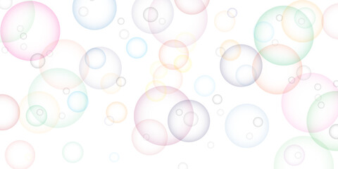 Soapy bright multicolored bubbles fly randomly on a white background. Beautiful circles colorful soap bubbles texture background. Design soap bubbles on a white background. Soap bubbles randomly flew.