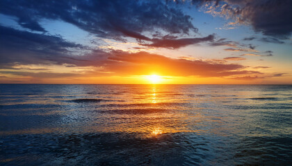 Vibrant Sunset Over Calm Ocean