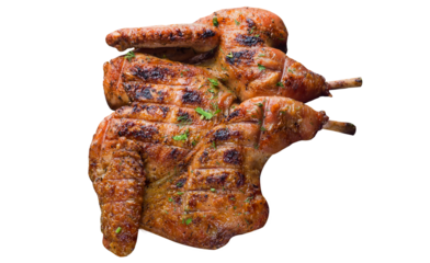 Grilled chicken with golden crust and herbs