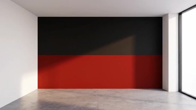 Modern Minimalist Room with Black and Red Accent Wall - An empty room features a minimalist design with a striking two-toned accent wall&mdash;black on top and red on the bottom&mdash;against white walls and a
