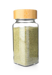Dried basil powder in glass jar isolated on white. Aromatic spice