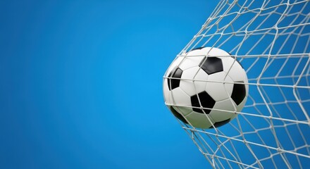 Fototapeta premium Soccer ball hitting the back of the net during a game winning goal