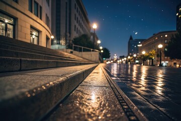 Nighttime Urban Setting With Wet Pavement and Glowing Street Lamps by a Building